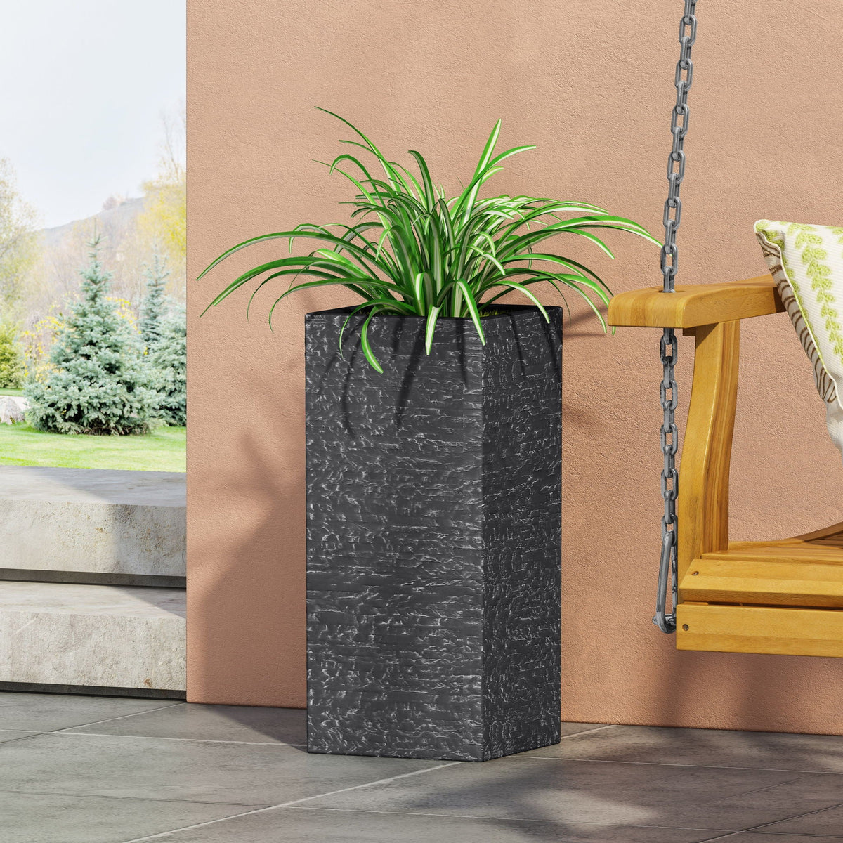 Modern Outdoor Planter by HouseOfZazla in black hammered finish with green foliage on Tampa Home & Garden Store