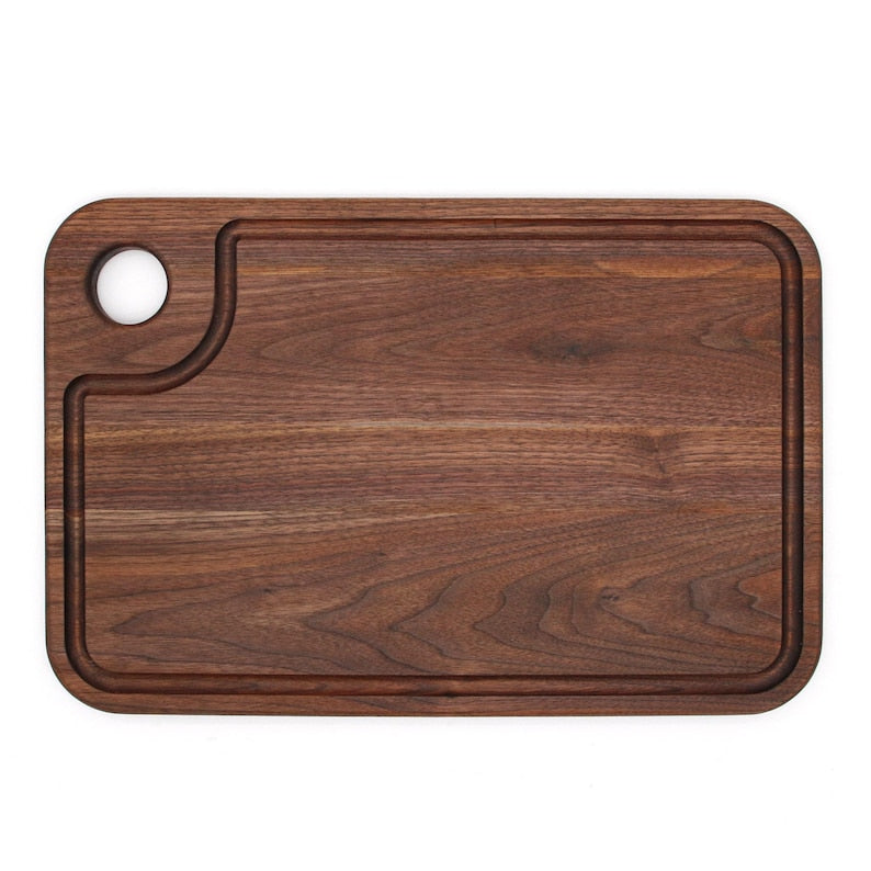 Thumb-Hole Cutting Board in walnut wood with rounded corners and edge groove on Tampa Home & Garden Store