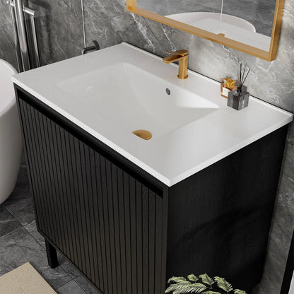 Bathroom vanity with ceramic sink, floor-standing black cabinet and gold faucet on Tampa Home & Garden Store