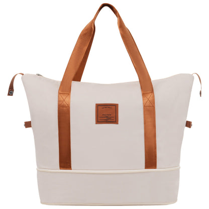 HouseOfZazla white tote bag with tan webbing straps, front label patch on Tampa Home & Garden Store