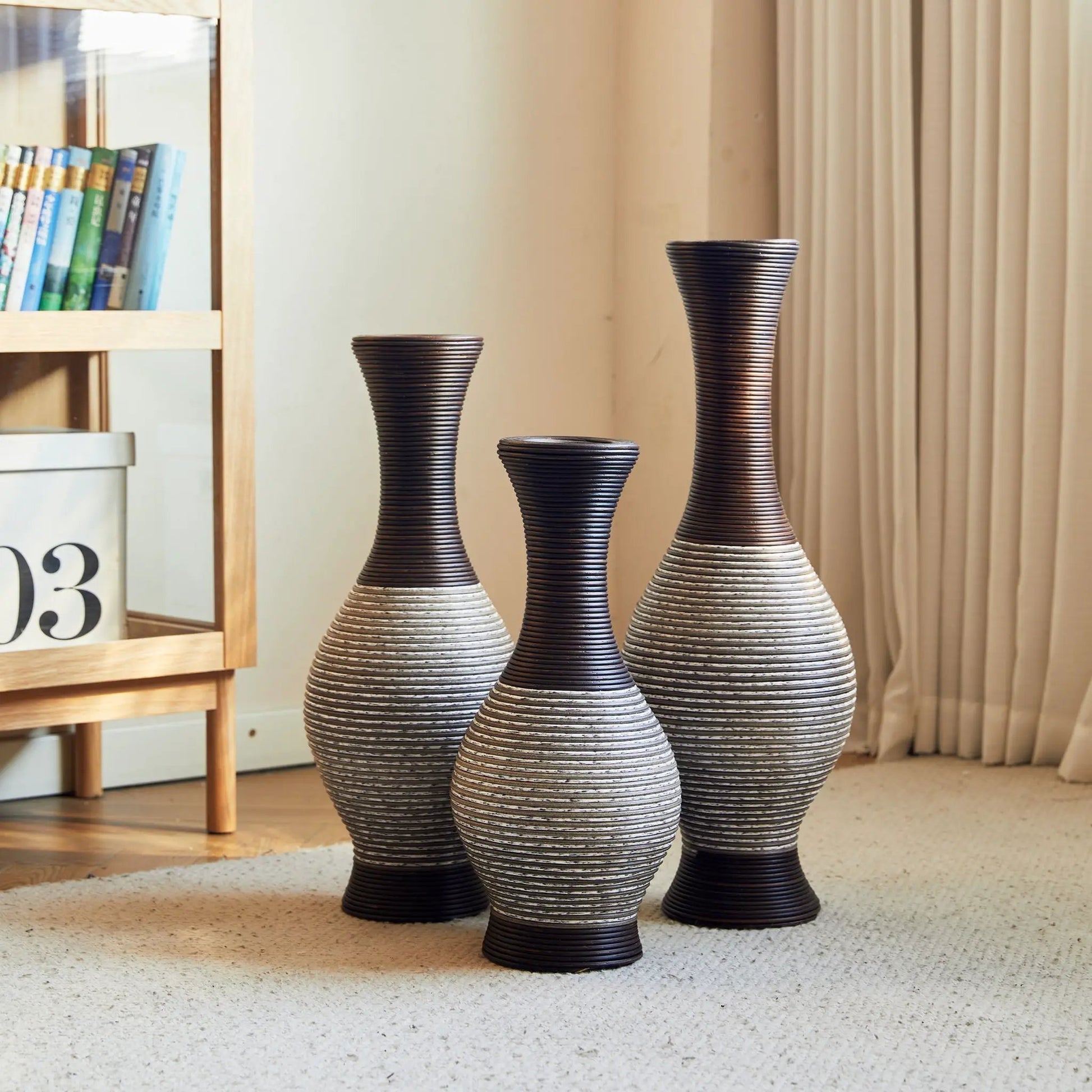 Tall designer floor vase set of four in dark-to-light ribbed ceramic with a two-tone finish on Tampa Home & Garden Store