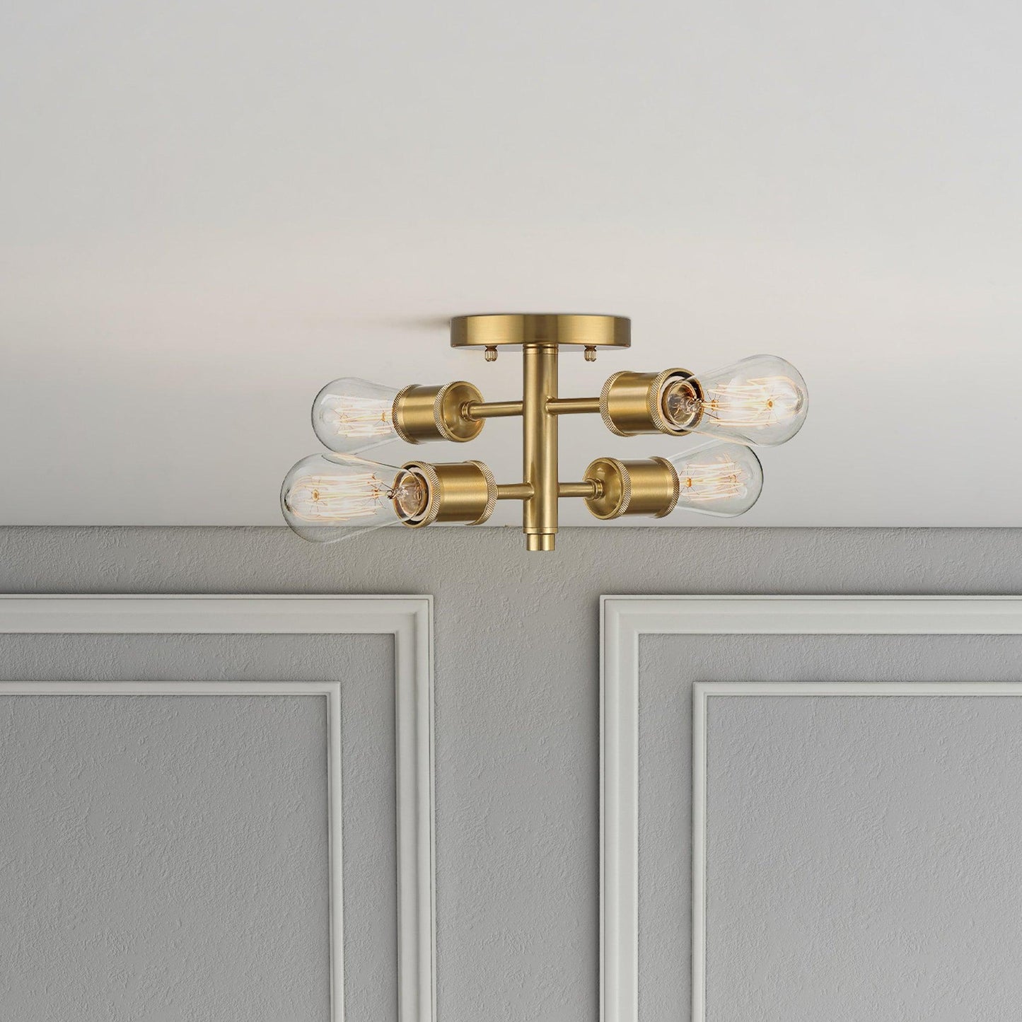 Ephemeral 4-light semi-flush ceiling mount in antique brass with clear glass tubes on Tampa Home & Garden Store