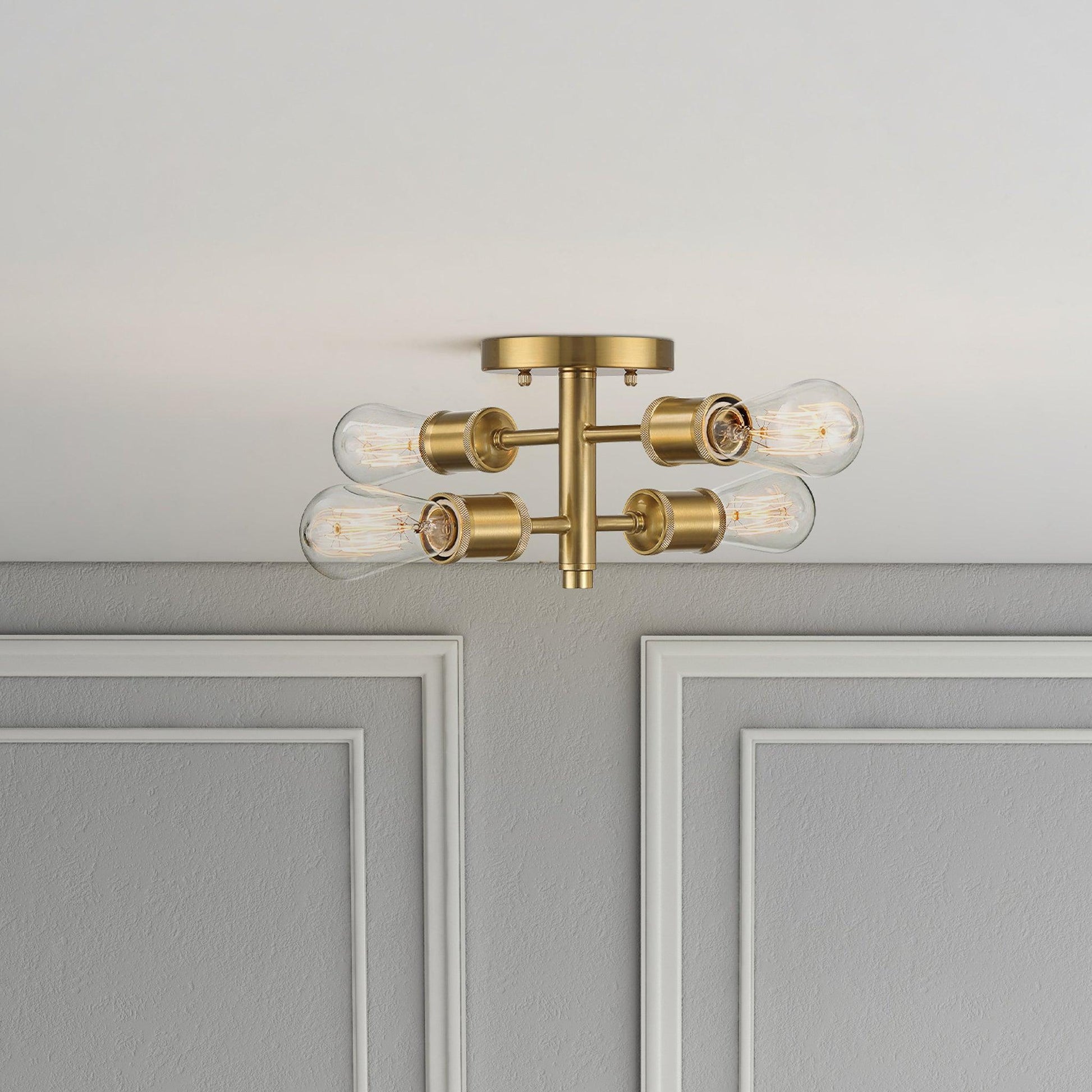 Ephemeral 4-light semi-flush ceiling mount in antique brass with clear glass tubes on Tampa Home & Garden Store