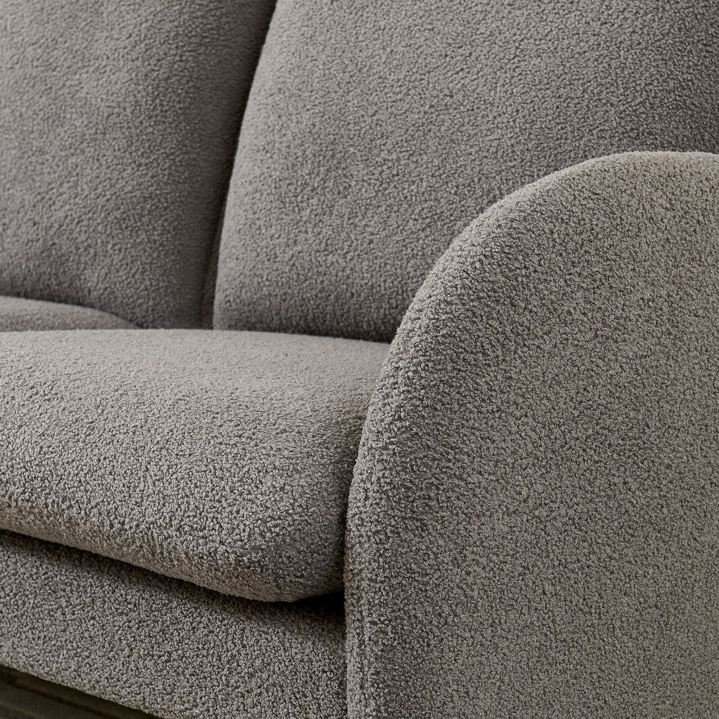 Loveseat sofa with plush sherpa fabric upholstery in taupe; close-up texture on Tampa Home & Garden Store