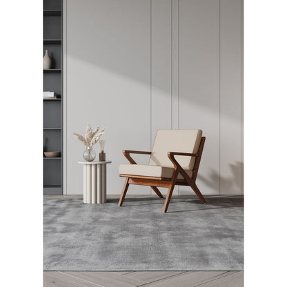 Martelle Accent Armchair with beige fabric upholstery and wood arms in a modern living room on Tampa Home & Garden Store
