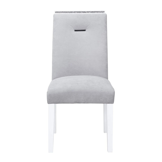 Ariya dining chair in light gray upholstery with crystal trim at the back and white legs on Tampa Home & Garden Store
