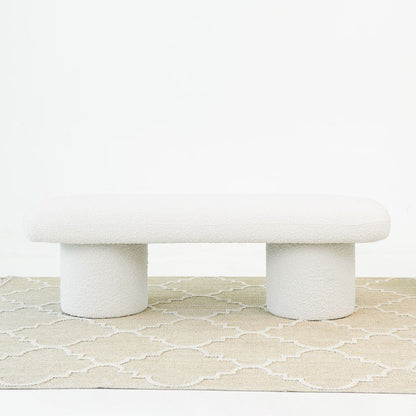 Ivory boucle fabric upholstered bench on two pedestal bases on Tampa Home & Garden Store