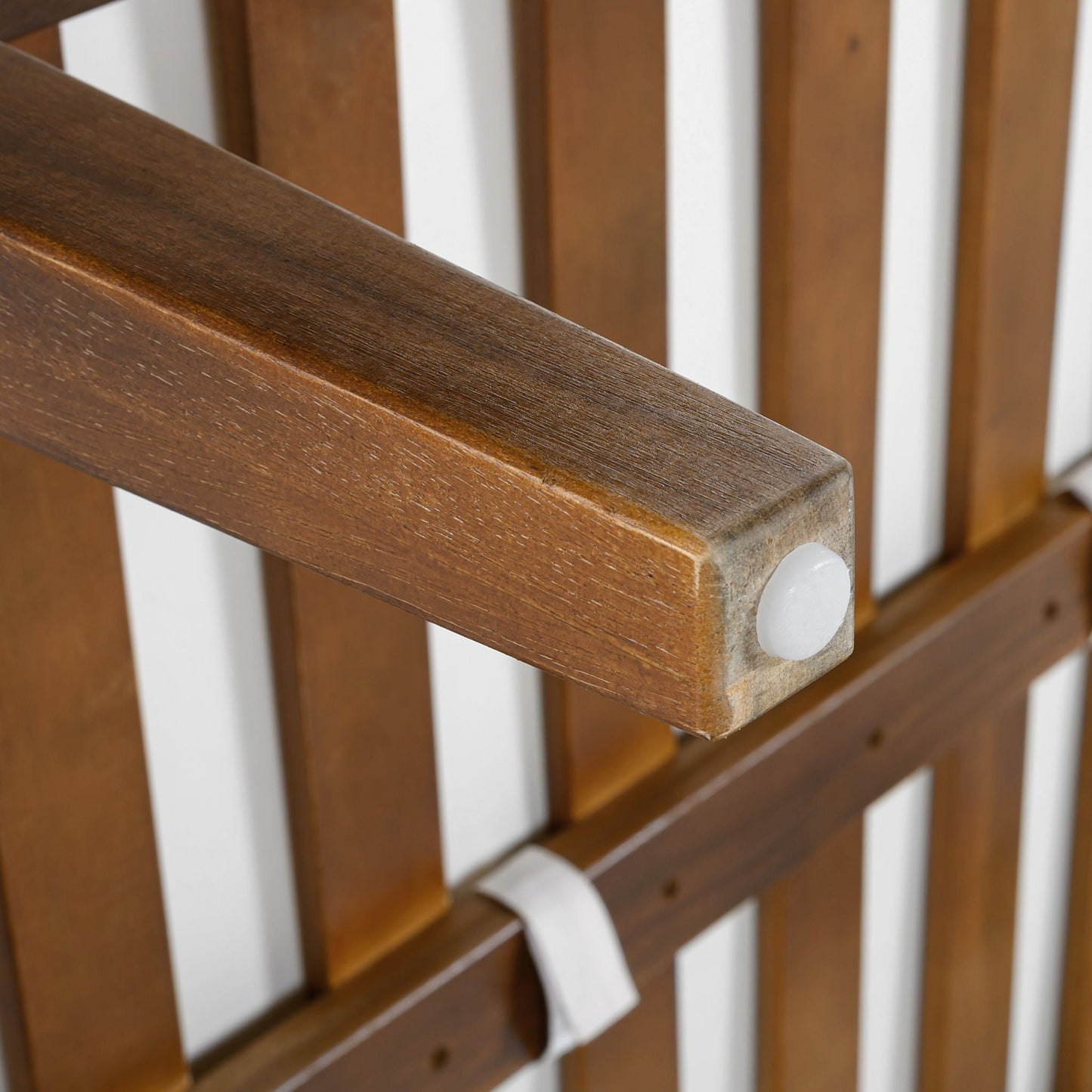 3 Piece Outdoor Sectional Sofa Set close-up of brown wood railing with white balusters on Tampa Home & Garden Store
