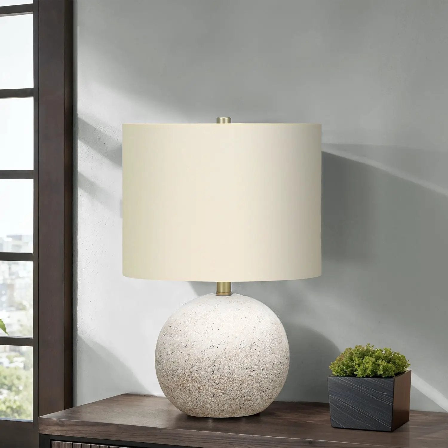Table lamp Lighting beige fabric shade atop speckled stone base by Unique Piece Furniture on Tampa Home & Garden Store