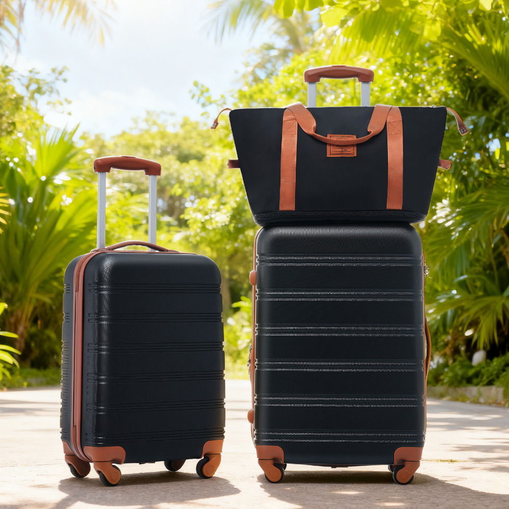 HouseOfZazla hardshell luggage set with 20in & 24in spinners in navy tan accents; tote atop on Tampa Home & Garden Store