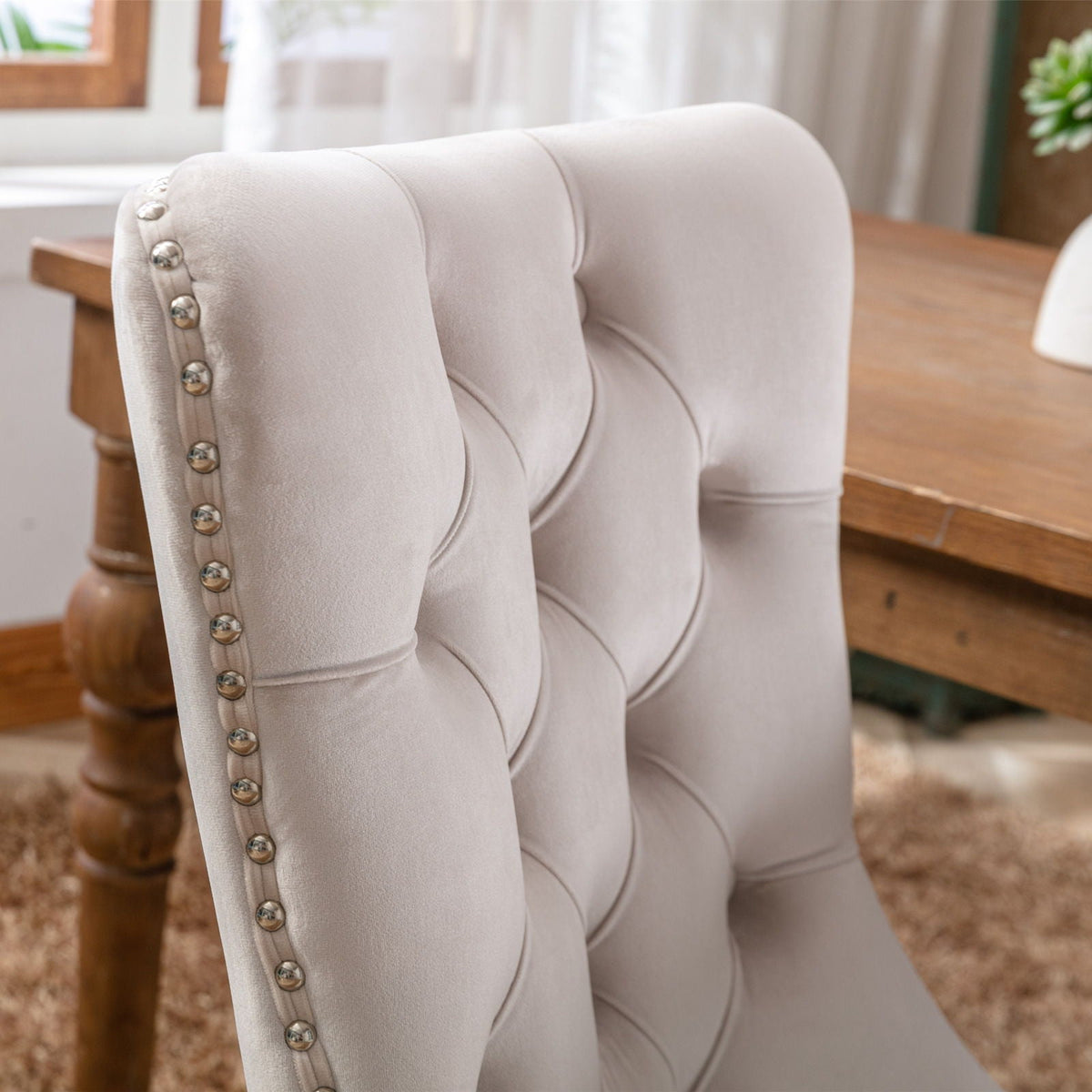 Tufted velvet dining chair set in cream with silver nailhead trim by HouseOfZazla on Tampa Home & Garden Store