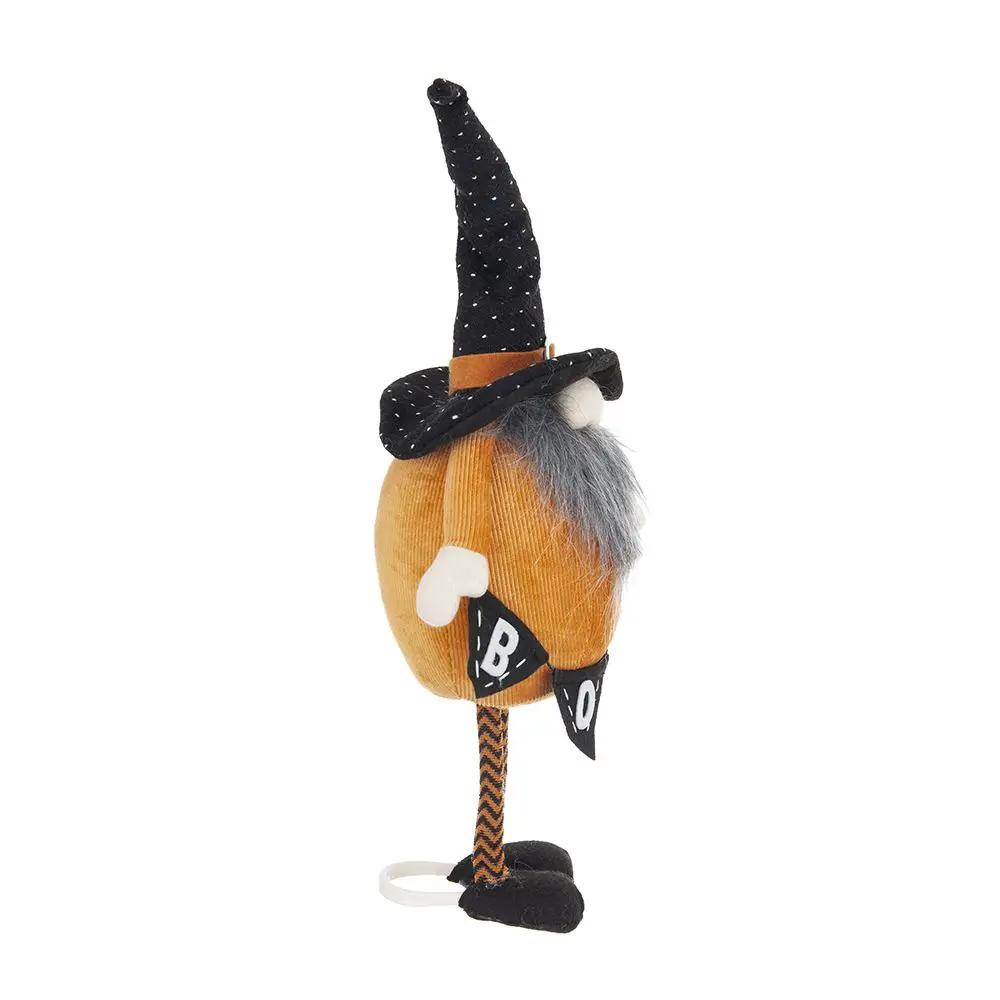 Standing Halloween gnome sculpture, orange body, tall hat, holding banner on Tampa Home & Garden Store