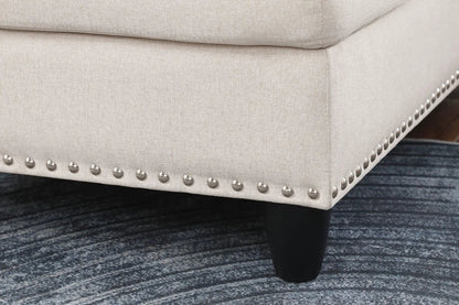 Alger wide left-hand facing beige sofa in linen fabric with silver nailhead trim on dark leg on Tampa Home & Garden Store