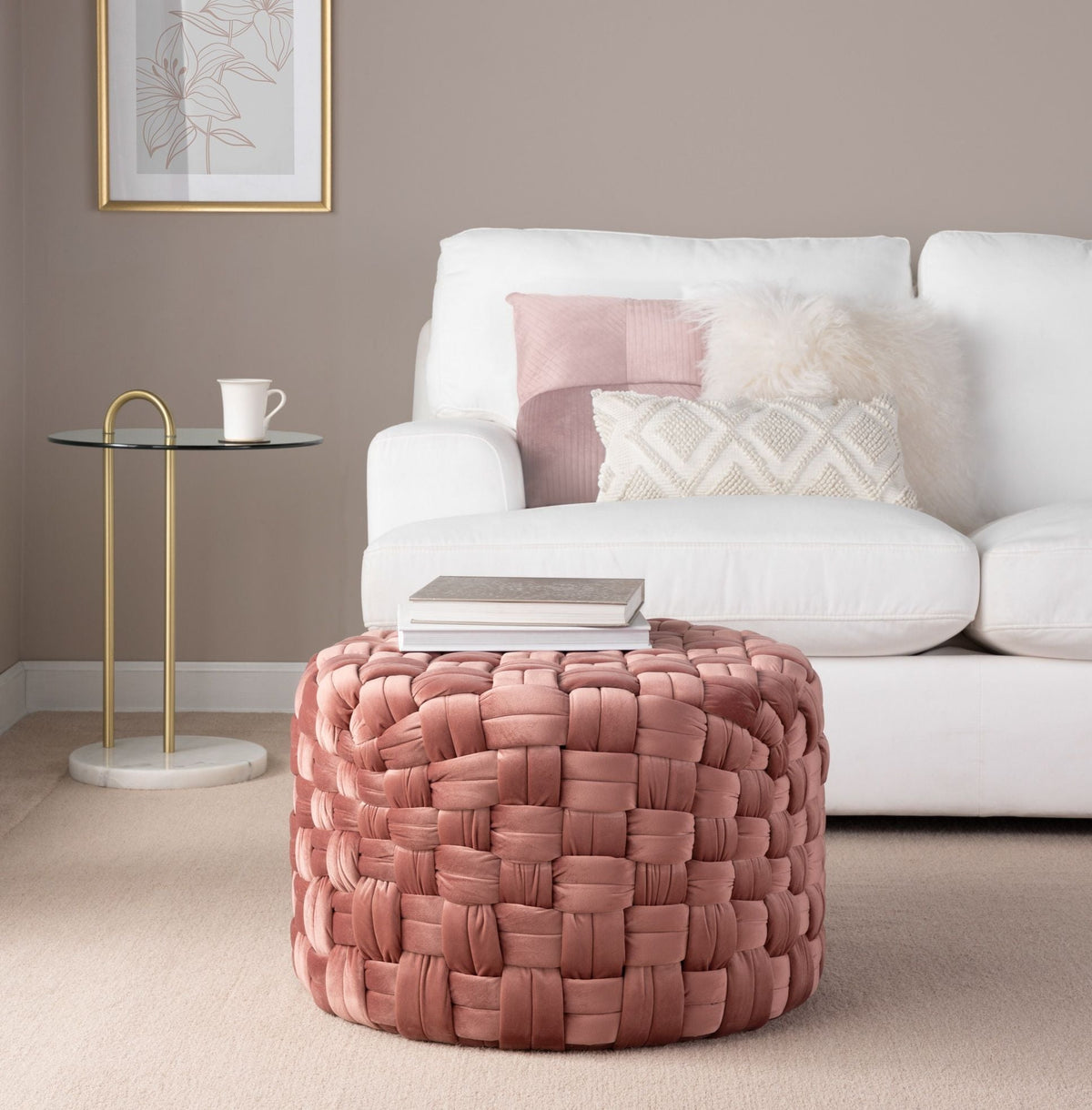 Pink braided round ottoman with chunky woven surface on Tampa Home & Garden Store