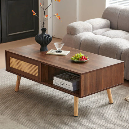 41.34-inch rattan coffee table with cane-woven panel and solid wood legs in a modern living room on Tampa Home & Garden Store
