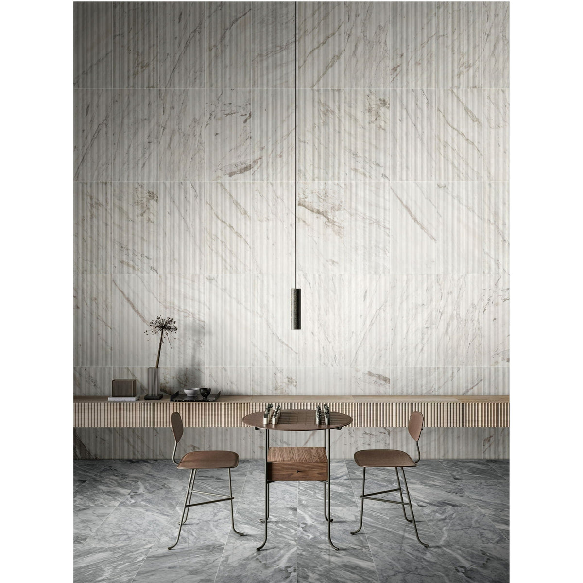 Textured marble decorative tiles with OL finish in white natural veining wall installation showroom scene on Tampa Home & Garden Store