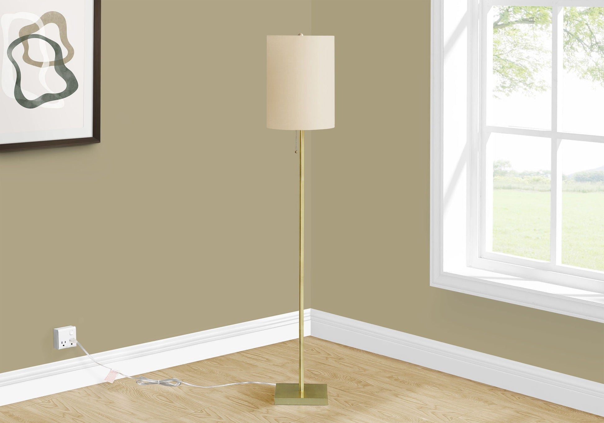 Brass Metal Lighting Floor Lamp with beige fabric shade in a sunlit room on Tampa Home & Garden Store