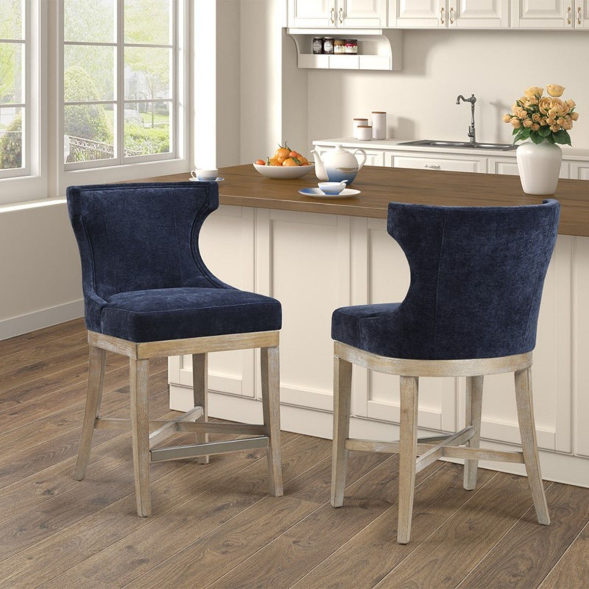 Carson Counter Stool with Swivel Seat, wingback navy blue upholstery, light wood legs pair on Tampa Home & Garden Store