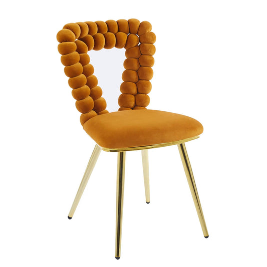 Modern chair with hairball back, orange velvet cushions and gold metal legs on Tampa Home & Garden Store