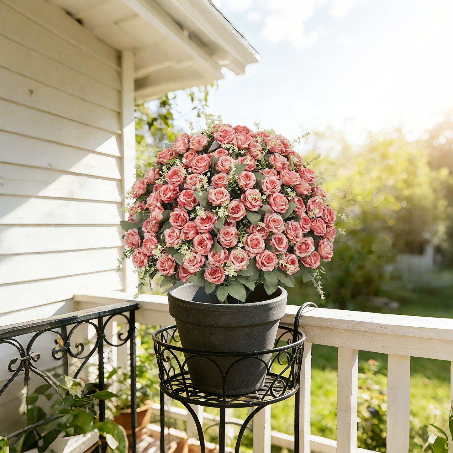 Indoor and Outdoor Silk Rose in a Cement Pot