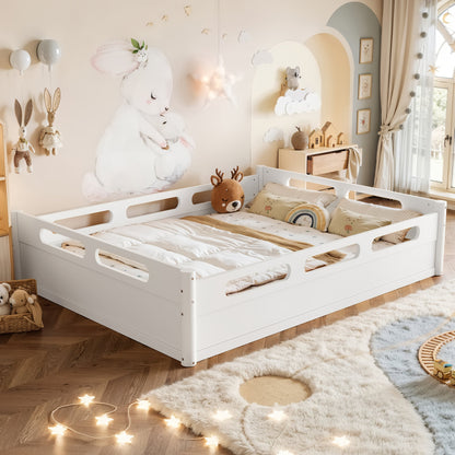 White queen size floor platform bed with guardrails in a pastel kids room with cloud mural on Tampa Home & Garden Store