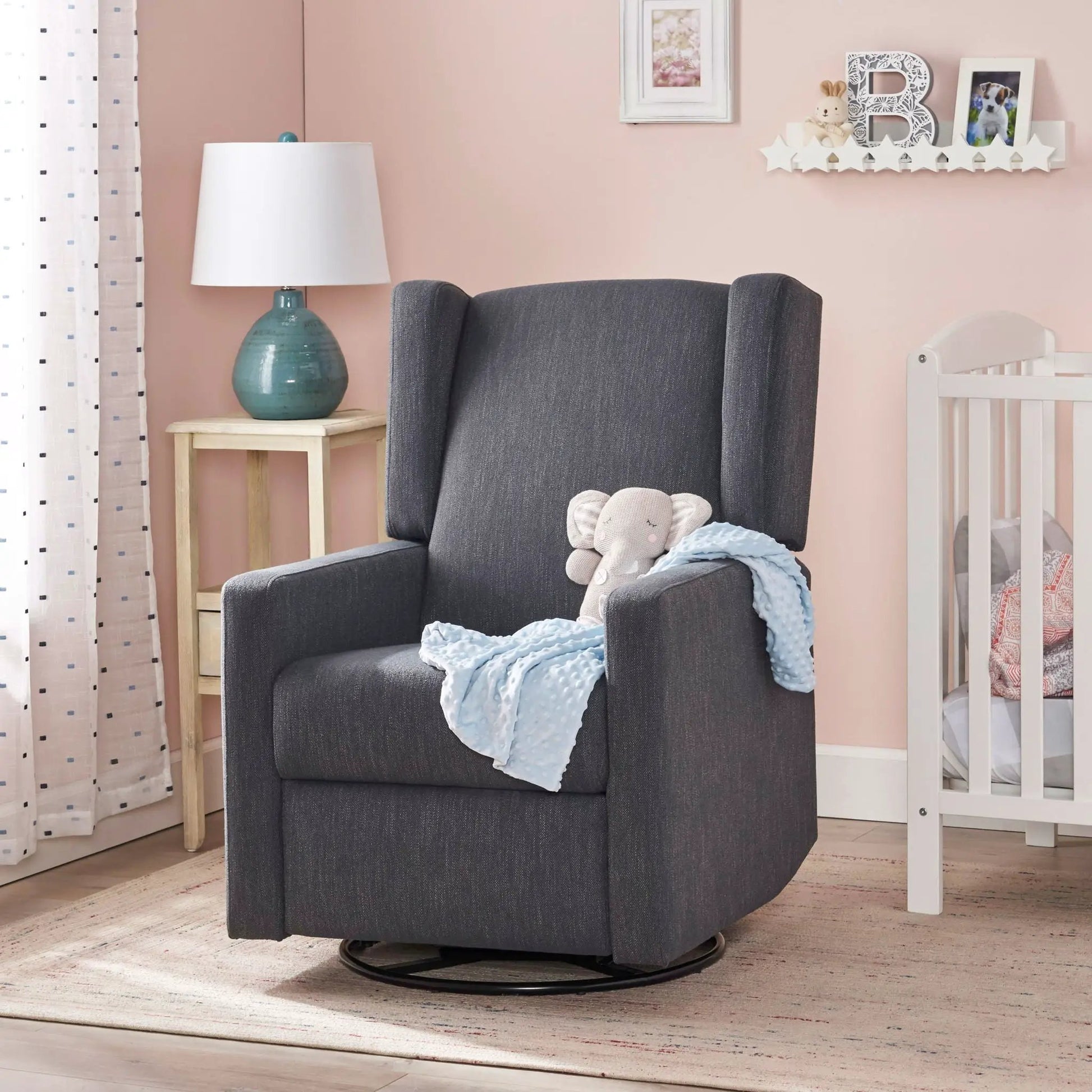 Landau Swivel Recliner in dark gray fabric by Unique Piece Furniture on Tampa Home & Garden Store