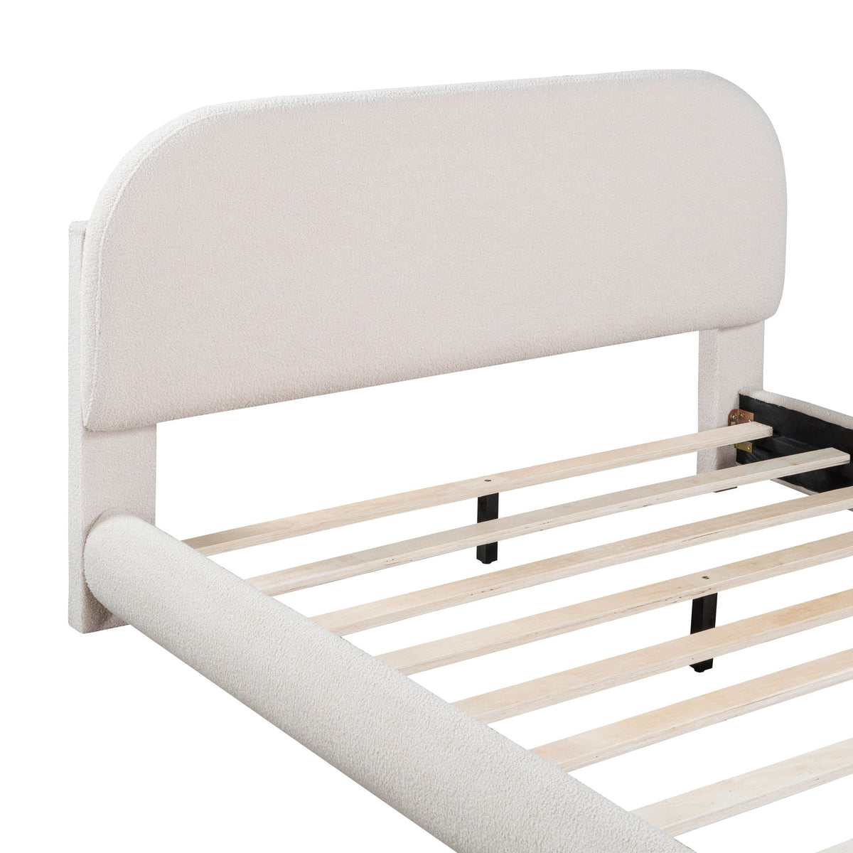 Upholstered platform bed with thick solid beige frame, curved headboard and wooden slat base on Tampa Home & Garden Store