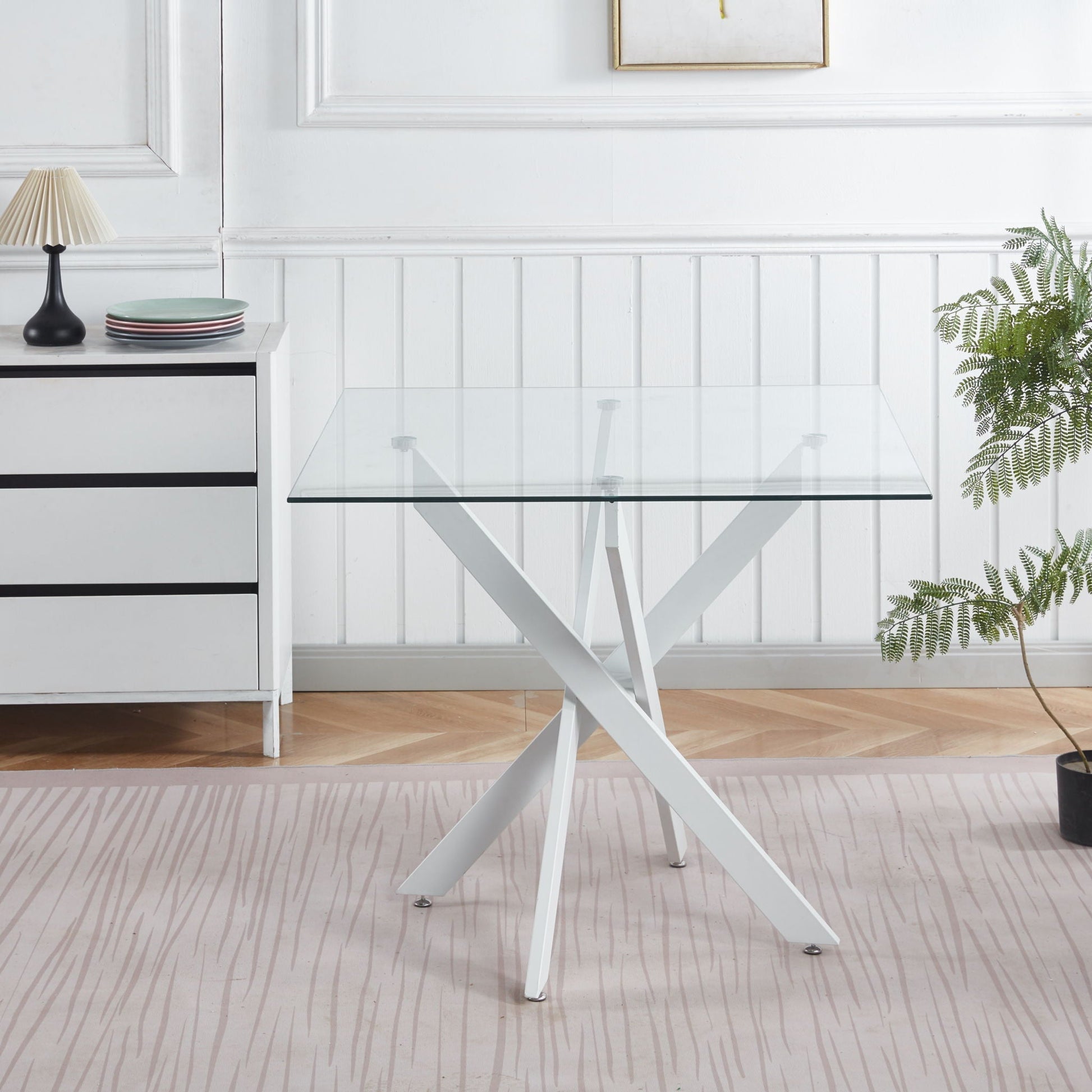 Dining table by HouseOfZazla with cross metal legs and tempered glass square top on Tampa Home & Garden Store