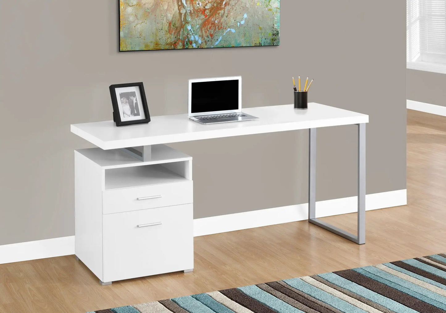 White computer desk with left storage cabinet and laptop on top for modern home office on Tampa Home & Garden Store