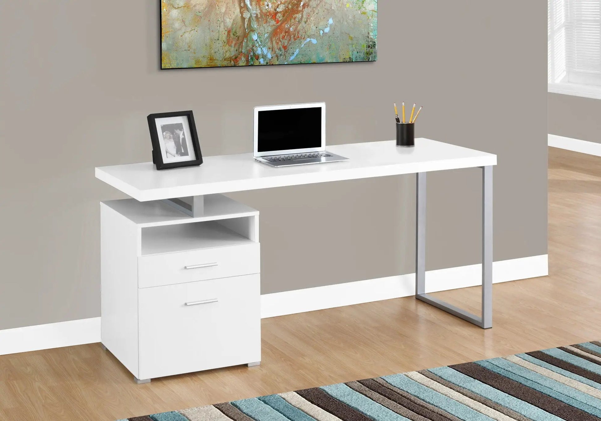 White computer desk with left storage cabinet and laptop on top for modern home office on Tampa Home & Garden Store