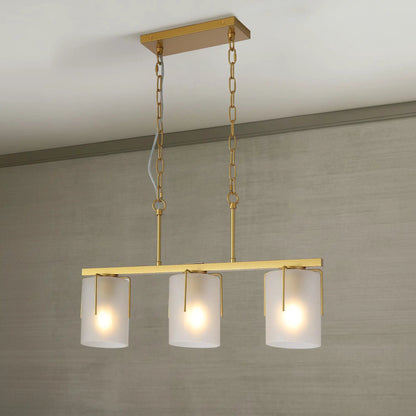 Adjustable cylindrical pendant light in gold brass with three frosted glass shades on gold chains on Tampa Home & Garden Store