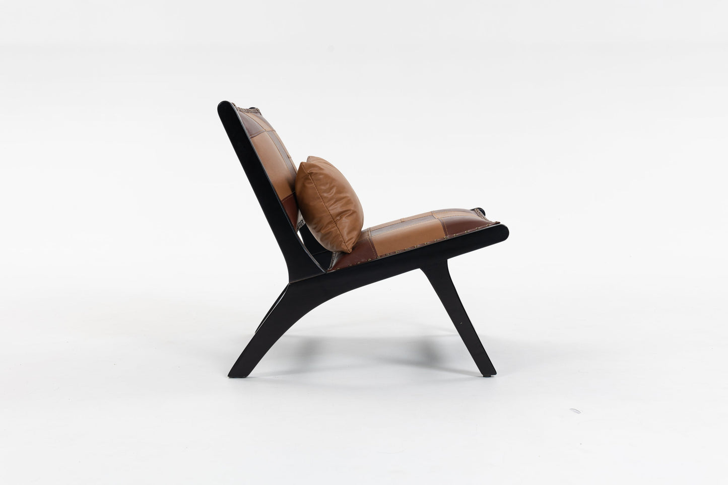 Modern Boho Accent Chair with leather patchwork cushions and black legs by HouseOfZazla on Tampa Home & Garden Store
