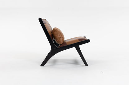 Modern Boho Accent Chair with leather patchwork cushions and black legs by HouseOfZazla on Tampa Home & Garden Store