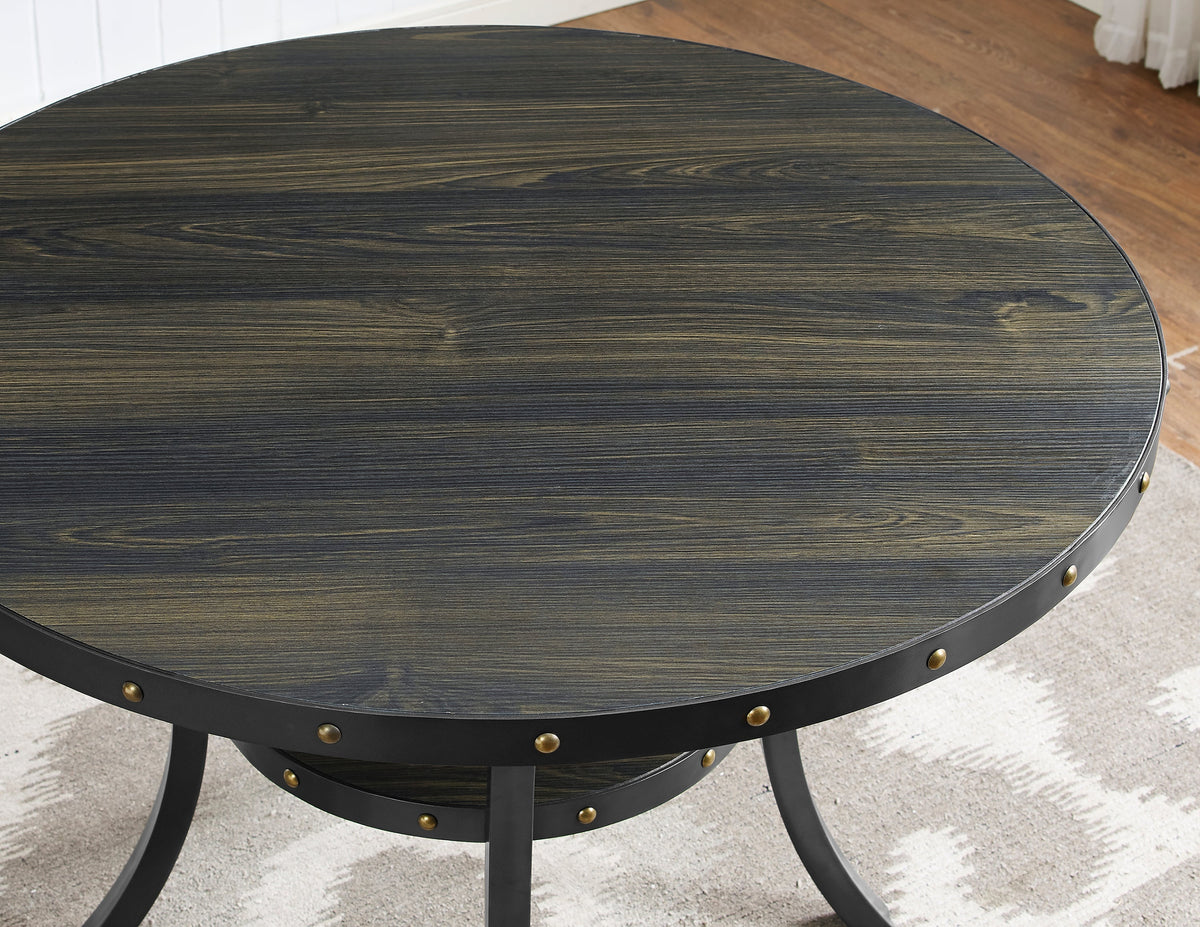 Espresso wood round dining table with black metal legs and brass nailhead trim from a 5-piece set on Tampa Home & Garden Store