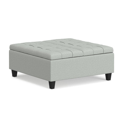 Stone gray storage ottoman coffee table with lift-top lid, tufted fabric, black legs on Tampa Home & Garden Store
