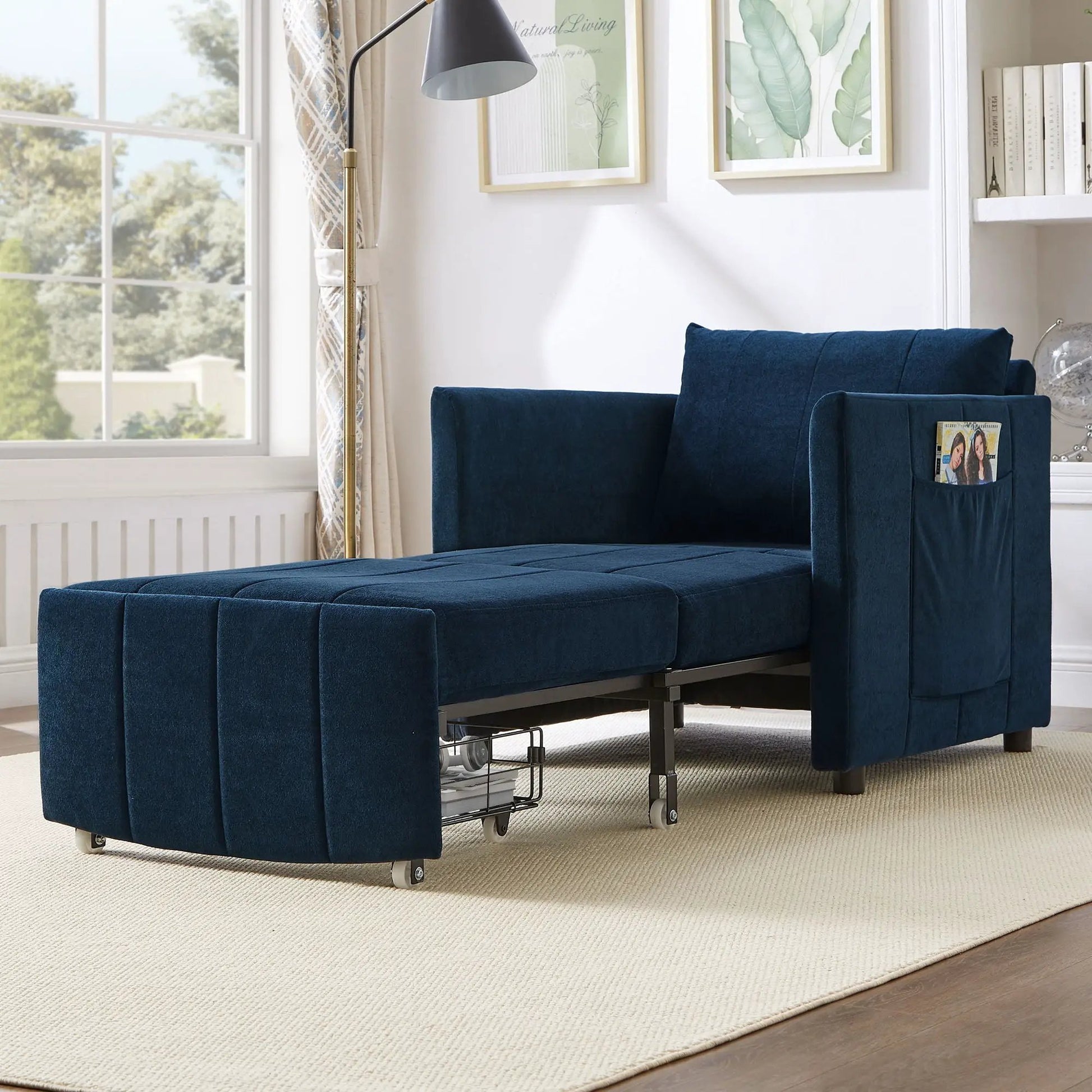 Upholstered convertible sleeper sofa in blue velvet with 5-position backrest and side pockets on Tampa Home & Garden Store