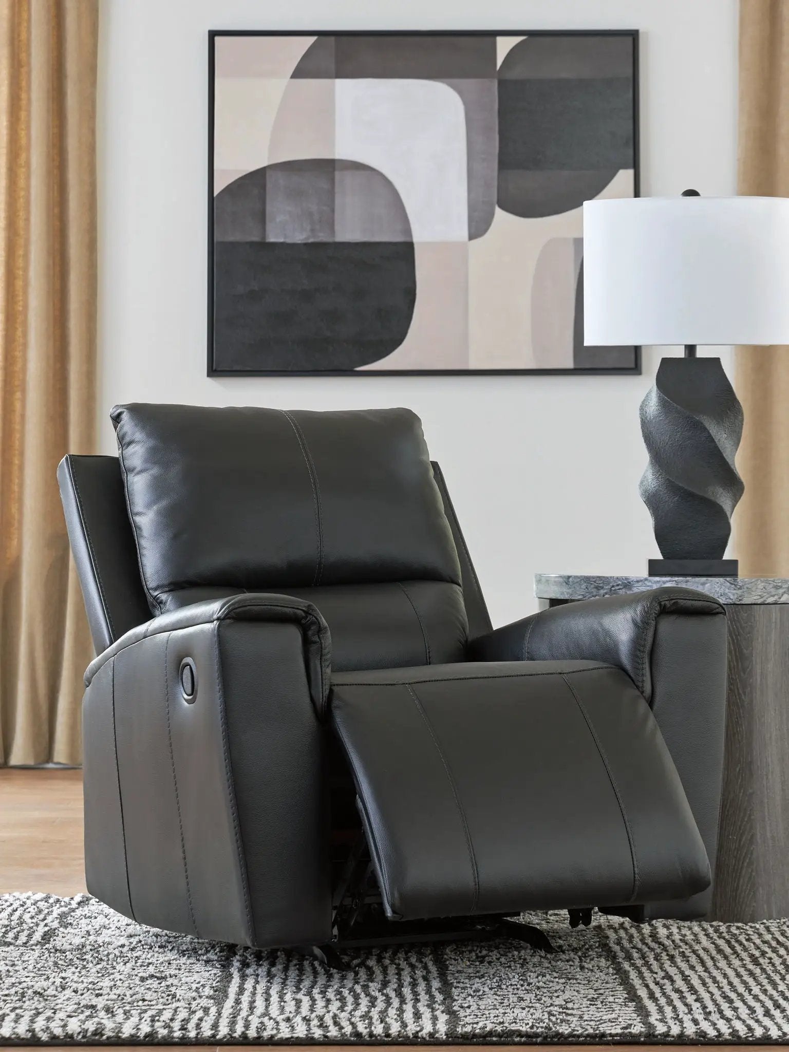 Glossmore Rocker Recliner by Unique Piece Furniture in black leather upholstery on Tampa Home & Garden Store