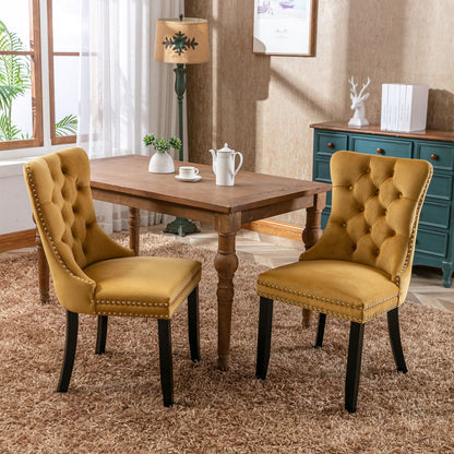 Tufted velvet dining chair set mustard yellow with nailhead trim, 2 chairs in dining room on Tampa Home & Garden Store