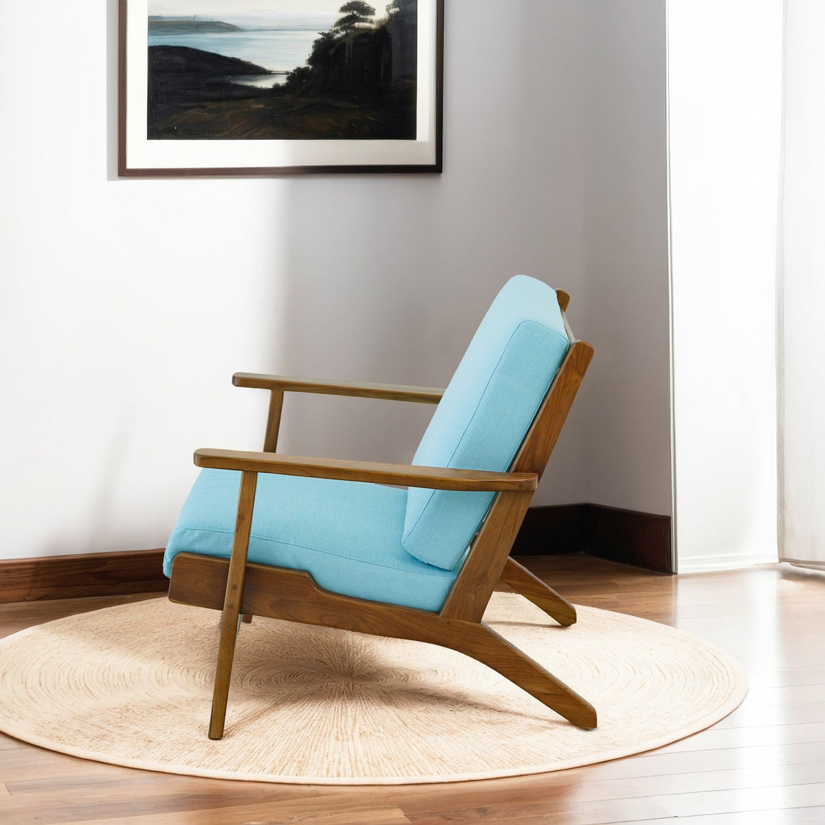 Genuine lounge chair with solid wood frame and light blue upholstery on Tampa Home & Garden Store