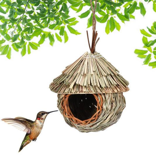 Hanging straw bird nest by Sell My Stuff, woven thatched roof, 1 nest, hummingbird nearby on Tampa Home & Garden Store