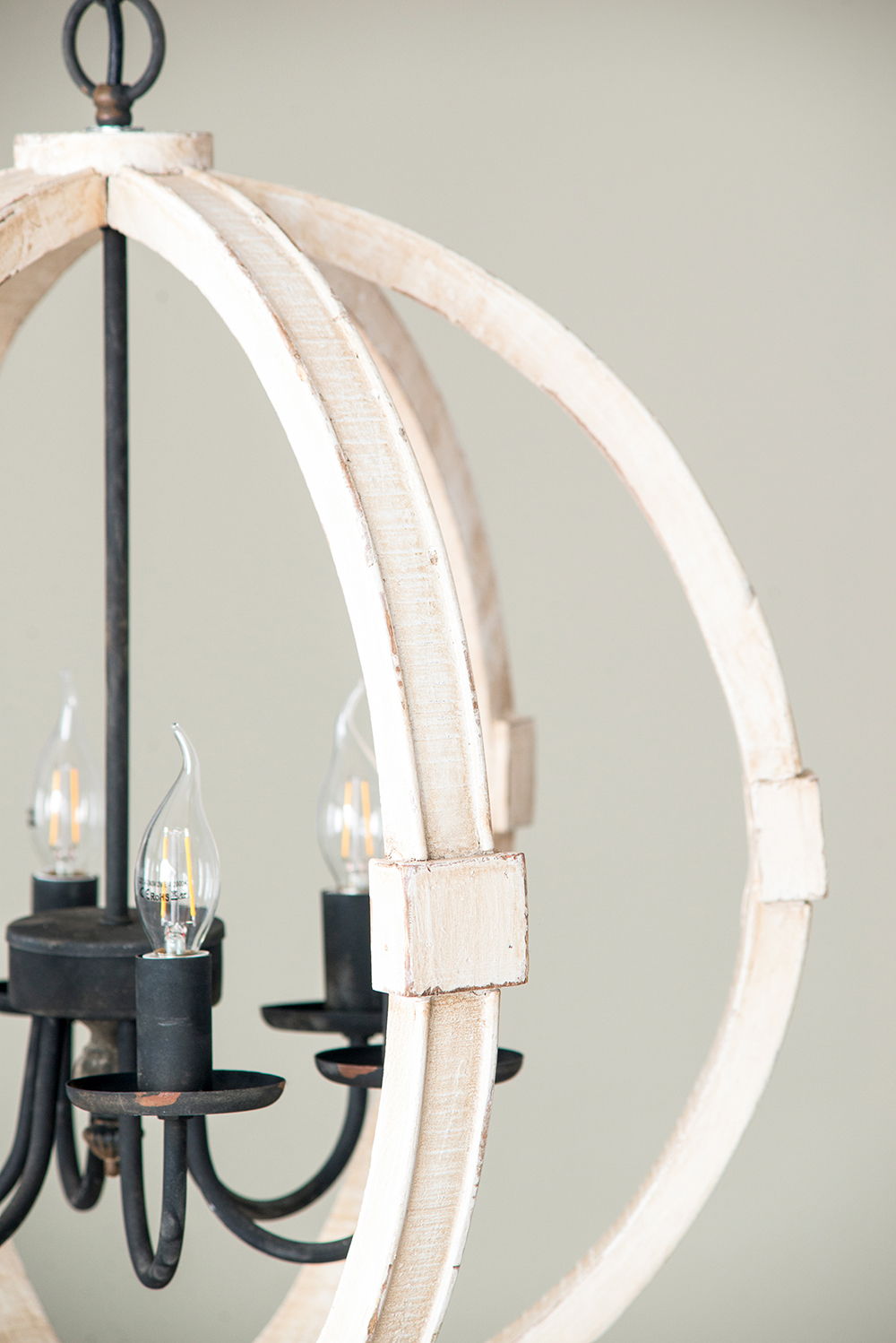 Chandelier distressed white ring frame with black candle-style arms and Edison bulbs on Tampa Home & Garden Store