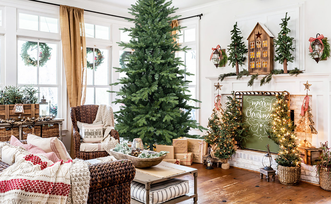 4ft green PVC/PE Christmas tree with 919 tips in a cozy living room by HouseOfZazla on Tampa Home & Garden Store
