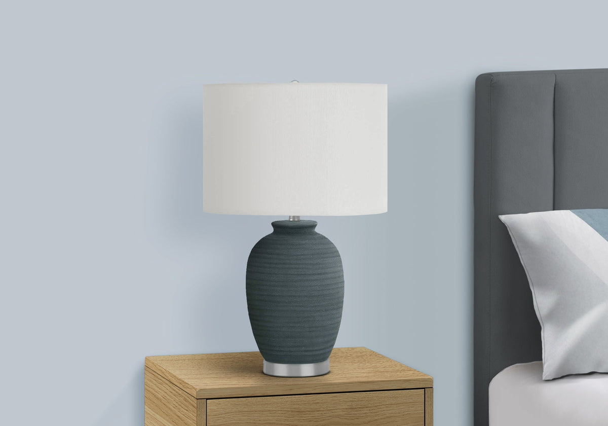 Table lamp HouseOfZazla, blue ceramic base with white shade on wooden nightstand on Tampa Home & Garden Store