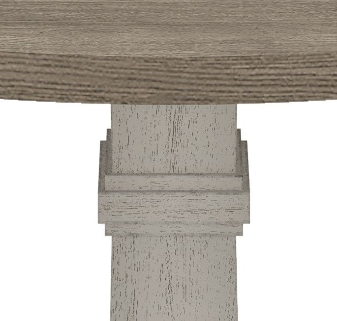 Round dining table with brown wood top and light gray pedestal base on Tampa Home & Garden Store