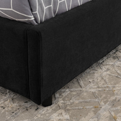 Storage hydraulic platform bed with integrated headboard in black fabric; gray geometric pillow on Tampa Home & Garden Store