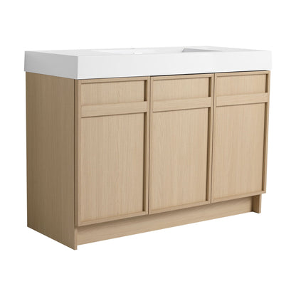 Freestanding bathroom vanity with white resin sink on oak cabinet and soft-close doors on Tampa Home & Garden Store