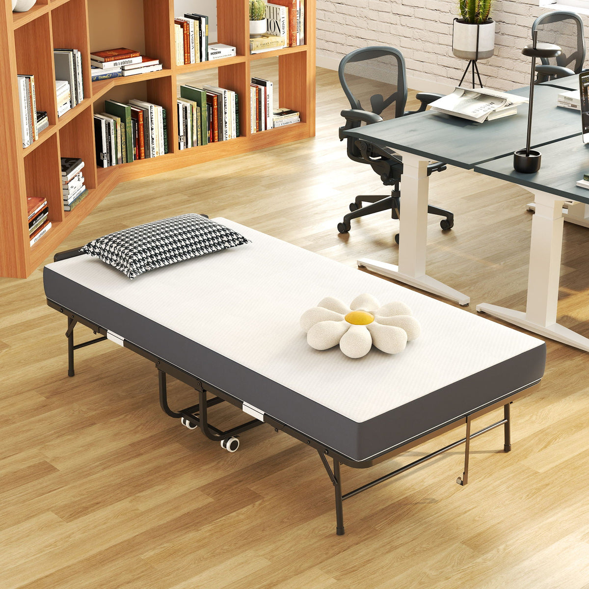 Twin folding bed with memory foam mattress, black frame on wheels in a modern home office on Tampa Home & Garden Store