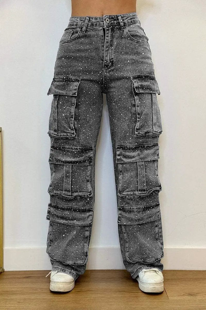 Women's graywashed denim cargo pants with multiple pockets and paint-splatter pattern on Tampa Home & Garden Store
