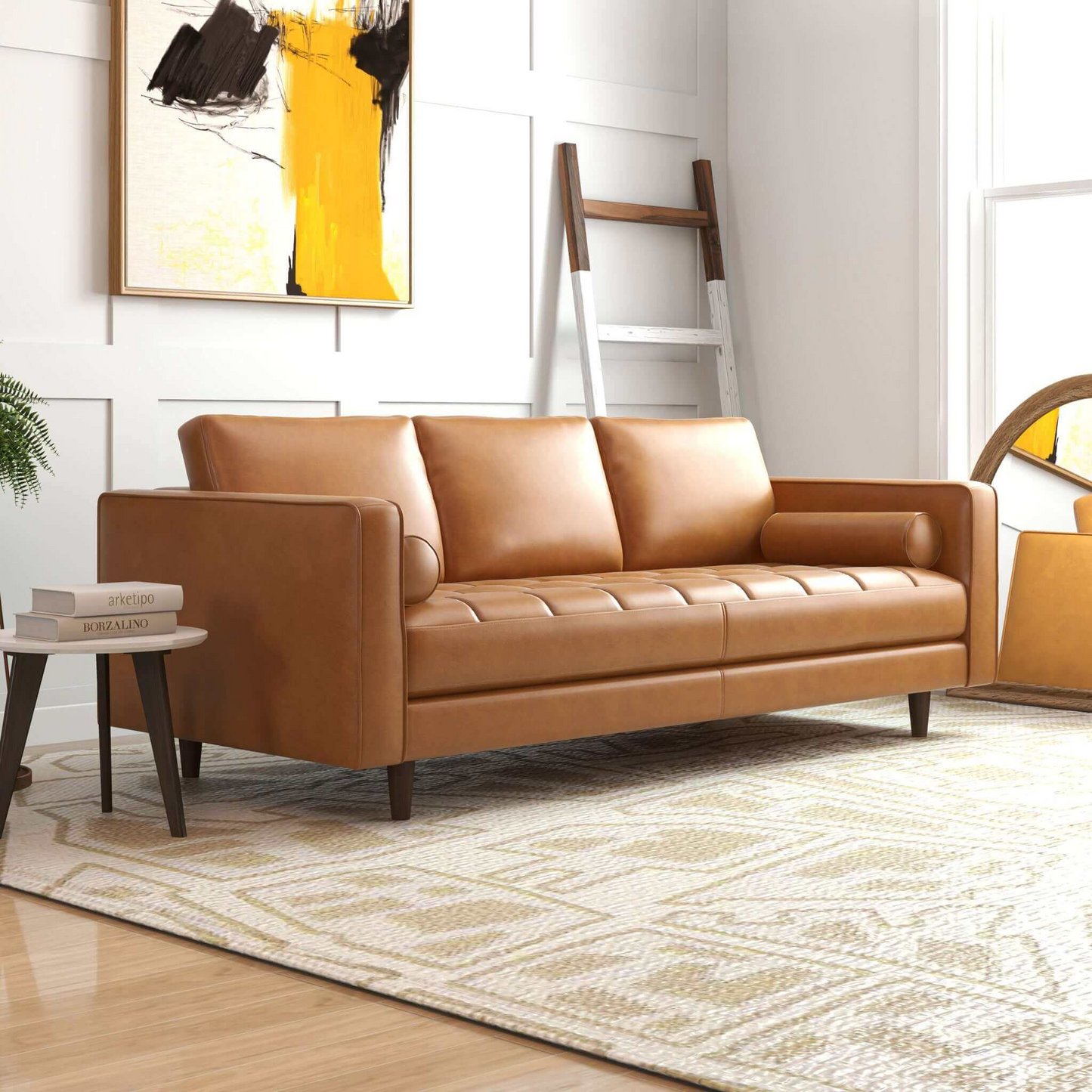 Catherine Sofa tan leather by HouseOfZazla in a white living room with yellow abstract art on Tampa Home & Garden Store