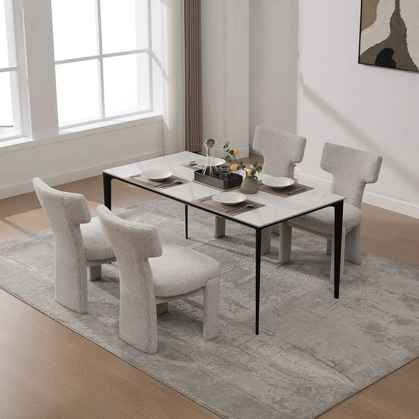 Armless curved-back accent chairs in light gray fabric around dining table; six chairs on Tampa Home & Garden Store